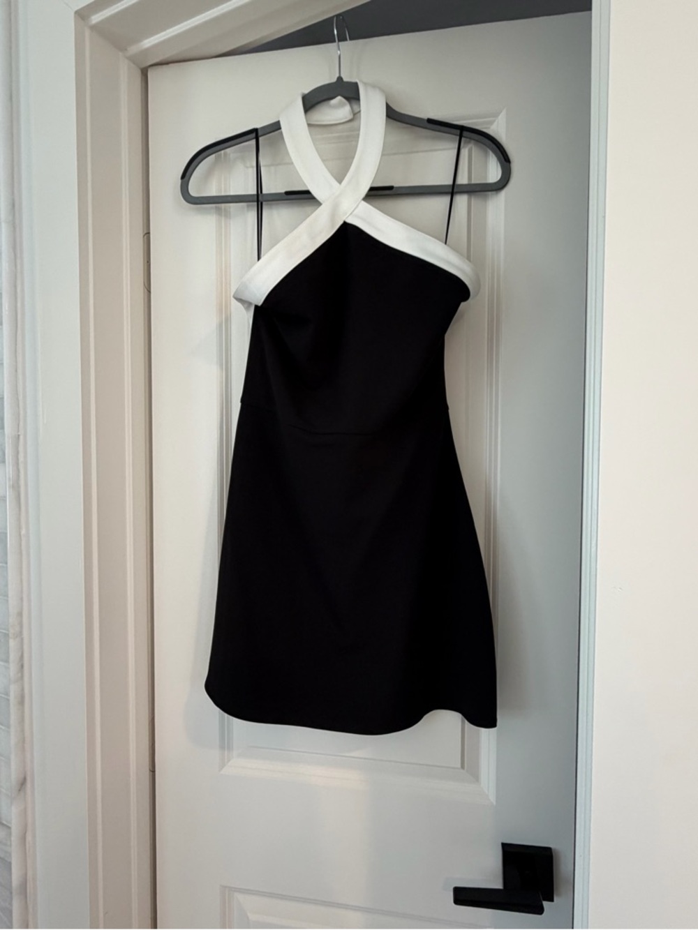 Chic Black Mini Dress with White Halter Trim